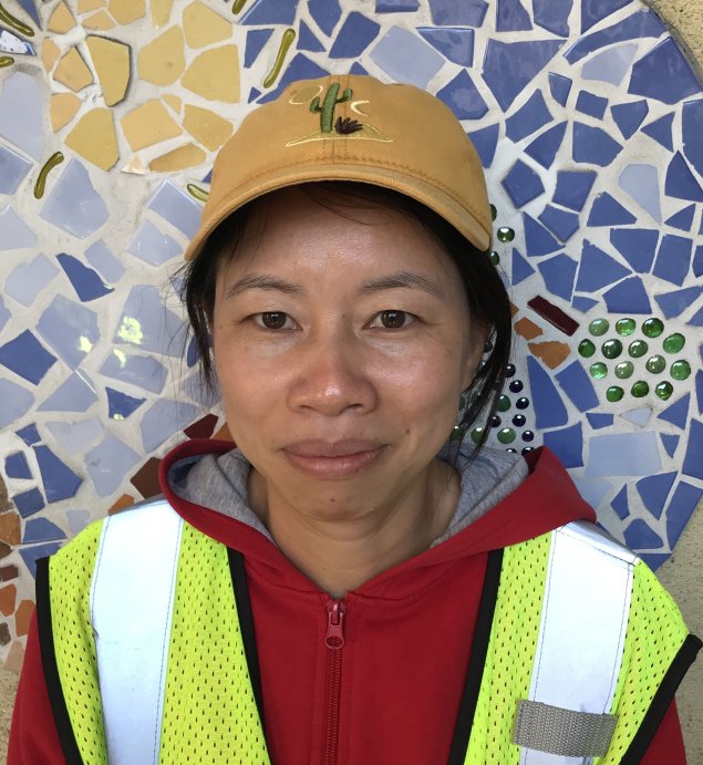 Asian woman with hat on
