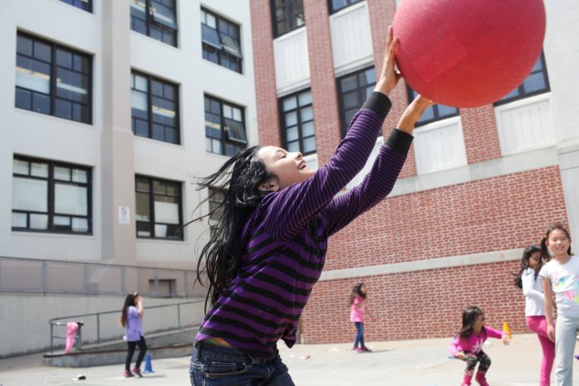 Girl playing ball