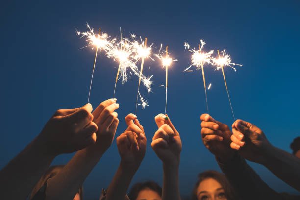 Hands holding sparklers