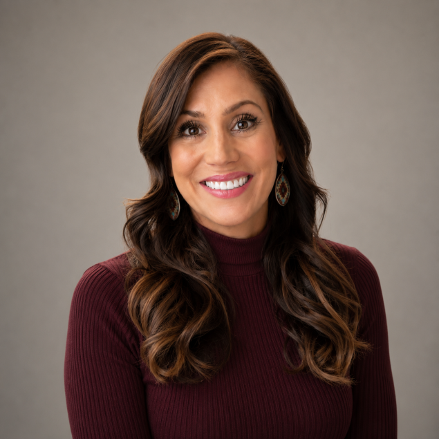 Smiling woman with long brown hair
