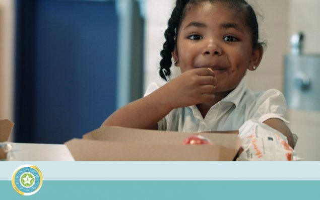 BeWell WSWC Nutrition - adorable child eating lunch