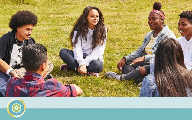 BeWell WSWC Counseling  - high school students outside in support group