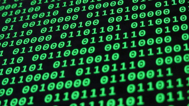 Screen display of green zeros and ones against a black background