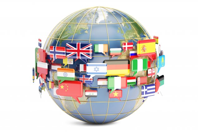 Globe surrounded by speech bubbles containing flags of many countries