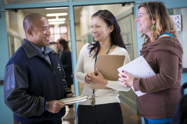 three teachers talking