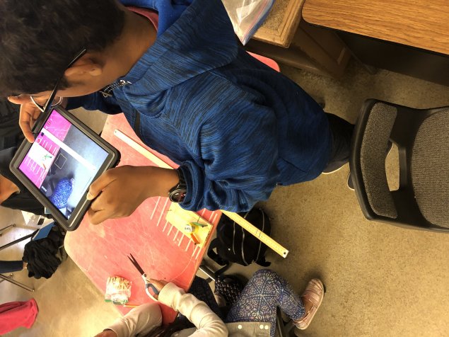 students take measurements in science